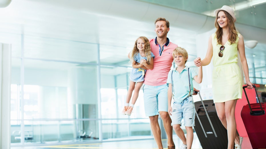 Family traveling in airport