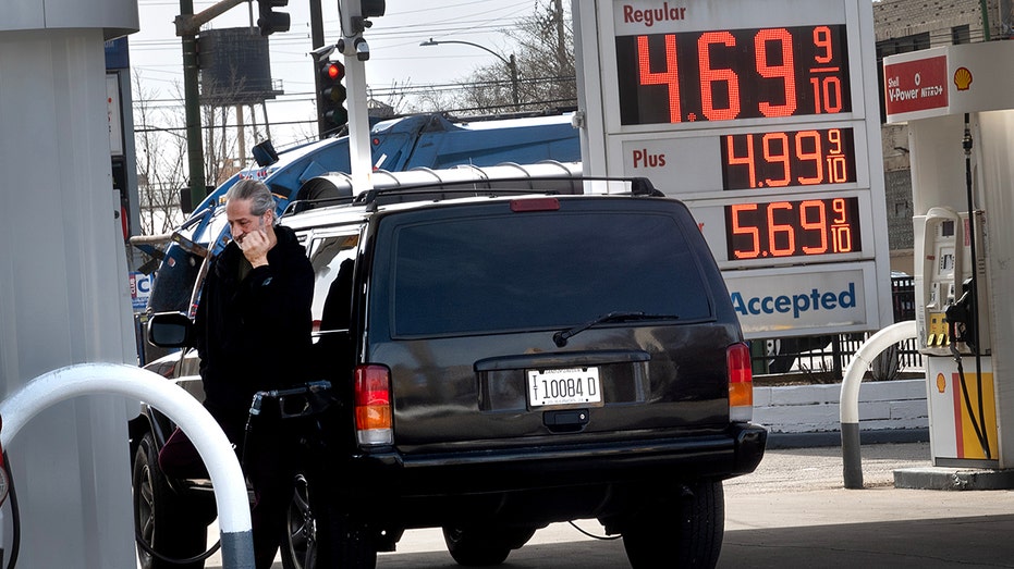 A customer pumps gas at a gas station in Chicago