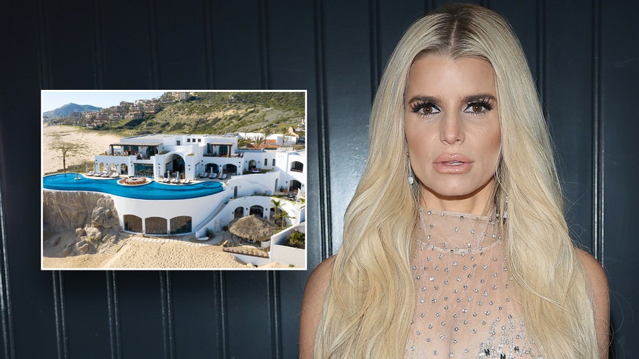 Jessica Simpson standing in front of a black backdrop with an inset of a beachfront home.