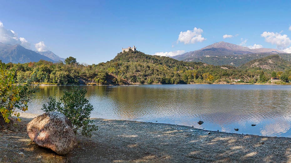 montalto dora castle overlooking a lake
