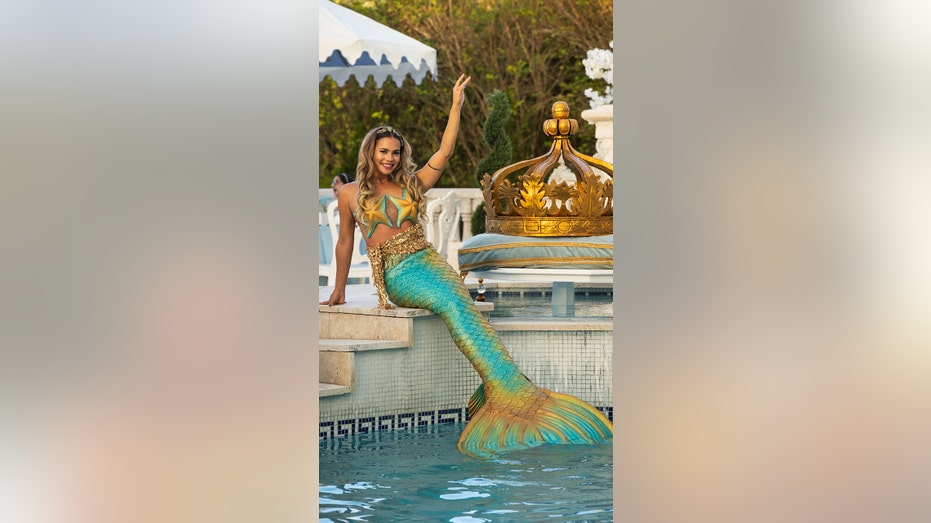 Jimenez in mermaid tail