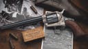 Colt revolver from Battle of Little Bighorn and WWII battle tank are top guns at Texas firearms auction