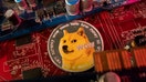 A representation of cryptocurrency Dogecoin is placed on a PC motherboard, in this illustration taken June 16, 2023. (REUTERS/Dado Ruvic/Illustration/File Photo)