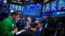 Traders work on the floor of the New York Stock Exchange (NYSE) in New York, U.S., on Friday, Oct. 12, 2018. U.S. stocks surged Friday after two days of market tumult as trade tensions with China seemed to ease, at least temporarily, with the countries planning to meet in November and the Treasury Department saying that&nbsp;China isn&apos;t manipulating its currency. Photographer: Michael Nagle/Bloomberg via Getty Images