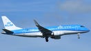 A KLM Embraer ERJ-190 jet is pictured in Italy in May 2021. A person died Wednesday at Amsterdam&apos;s airport after falling into one of the aircraft&apos;s engines.