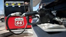 A Phillips 66 logo is seen on a gas pump as a car is filled a Beck&apos;s station in Princeton, Illinois, U.S., on Monday, March 5, 2012. Prices have increased 15 percent this year and are 7.8 percent higher than a year earlier. Photographer: Daniel Acker/Bloomberg via Getty Images