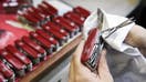 Penknives are assembled at the Victorinox AG Swiss army knife factory in Ibach, Switzerland, on Thursday, Jan. 20, 2011. Victorinox, founded in 1884 in the central Swiss town of Ibach, is the sole provider of the knives after buying rival Wenger SA in 2005. 