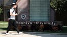 A student walks by the campus of Yeshiva University in New York City on August 30, 2022 in New York City.
