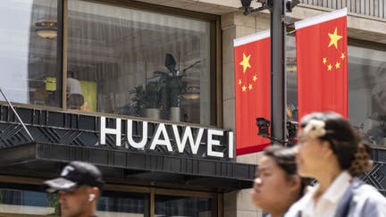 Signage at a Huawei Technologies Co. store in Shanghai, China, on Friday, May 3, 2024. Huawei, the Chinese telecommunications giant blacklisted by the US, is secretly funding cutting-edge research at American universities including Harvard through an independent Washington-based foundation. 