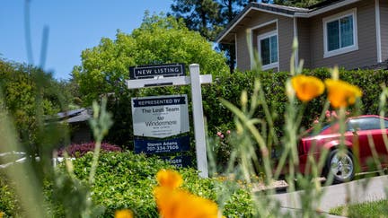 A "New Listing" sign outside a home in Napa, California, US, on Monday, May 6, 2024.