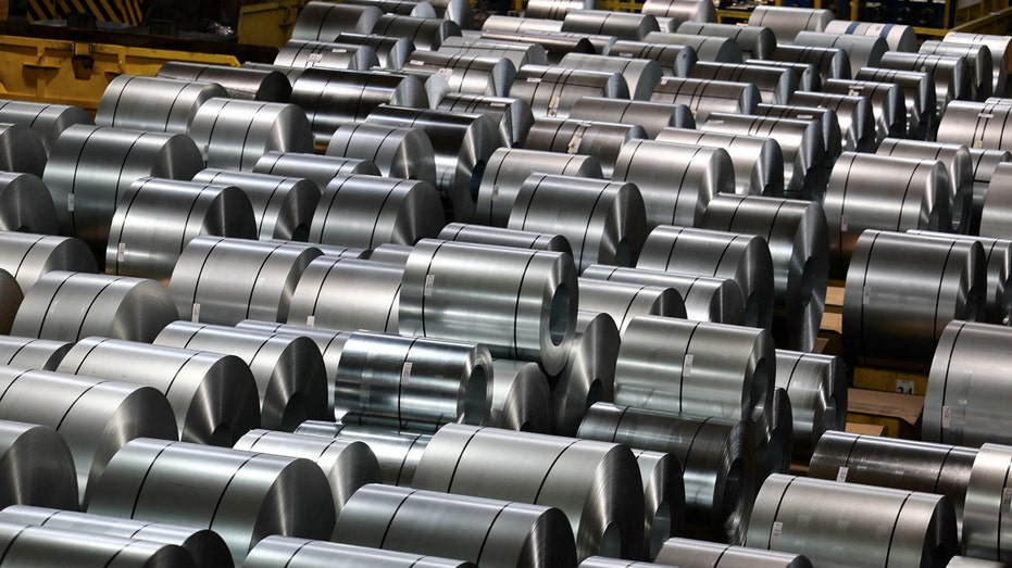 Steel coils are waiting for delivery at the storage and distribution facility