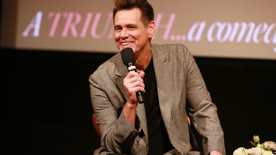 Jim Carrey speaking during a panel
