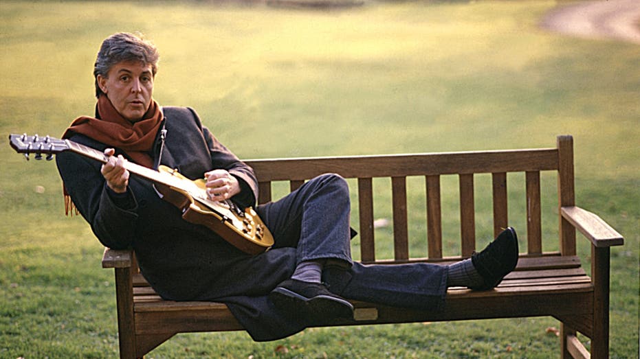 Paul McCartney with a guitar