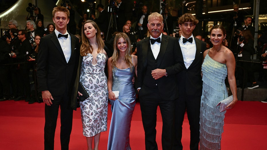 US actor Kevin Costner (3th R) poses with his children (From L) Cayden Wyatt Costner, Lily Costner, Grace Avery Costner, Hayes Costner and Annie Costner after the screening of the film "Horizon: An American Saga" at the 77th edition of the Cannes Film Festival