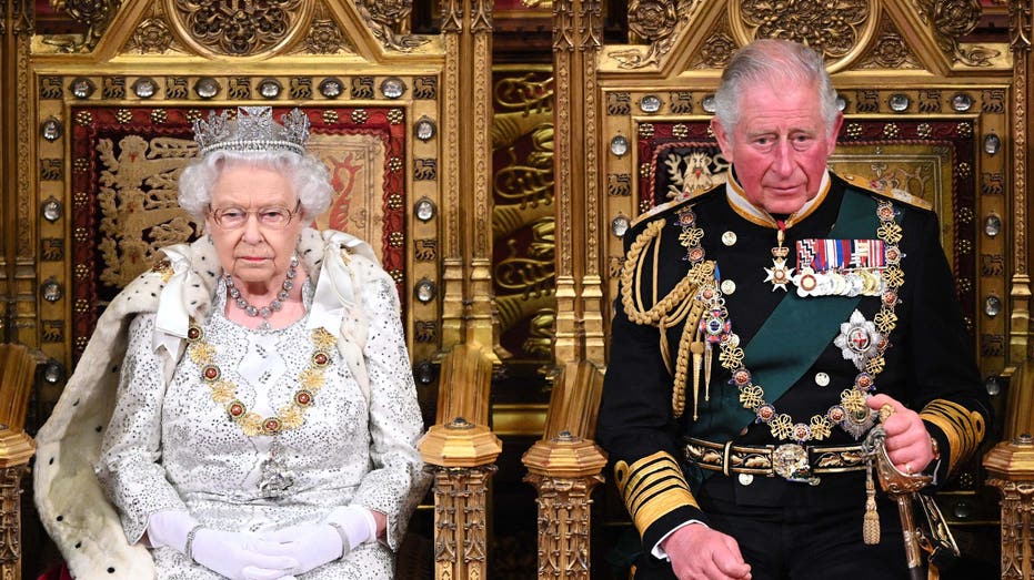 Queen Elizabeth sits next to then-Prince Charles