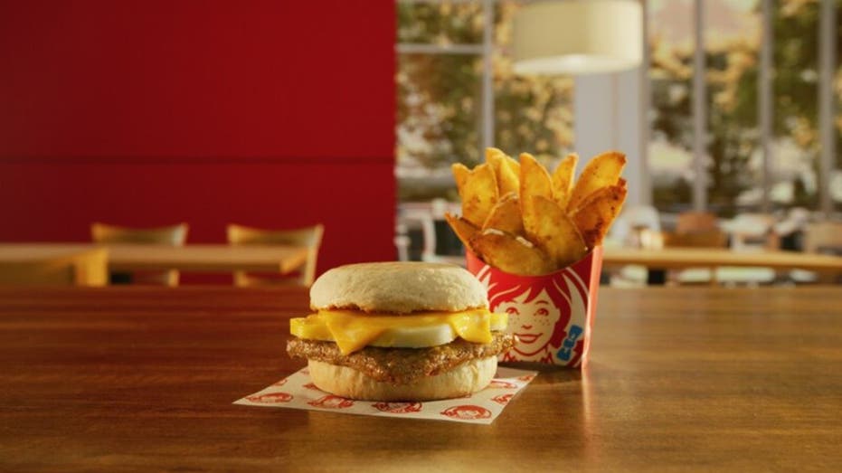 Wendy's english muffin sandwich and potato wedges