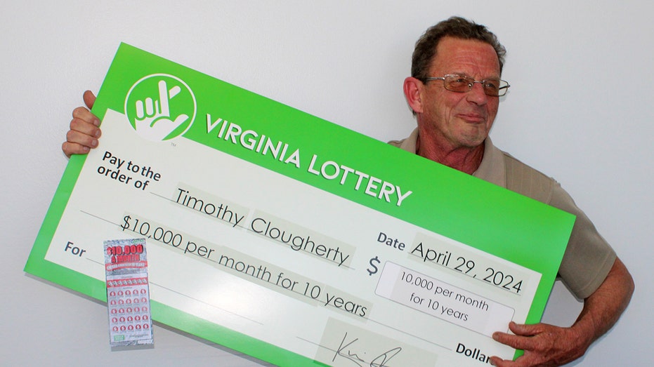 Man holding giant check