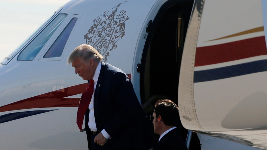 Trump disembarks Cessna jet