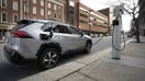 PORTLAND, ME - MARCH 20: A Toyota Rav4 plugin hybrid charges at a ChargePoint charger in front of City Hall in Portland on Wednesday. The state Board of Environmental Protection voted on Wednesday to reject a mandate to dramatically increase sales of electric and hybrid vehicles in Maine. 