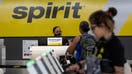 Travelers check-in at the Spirit Airlines counter at Fort Lauderdale-Hollywood International Airport (FLL) in Fort Lauderdale, Florida, US, on Oct. 24, 2023.