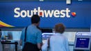 Travelers use a Southwest Airlines Co. self check-in kiosk at Logan International Airport (BOS) in Boston, Massachusetts, U.S., on Friday, July 19, 2019. Southwest Airlines is scheduled to release earnings figures on July 25. Photographer: - Fox Business News