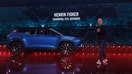 Henrik Fisker, CEO of electric-vehicle maker Fisker Inc., stands next to his company's flagship electric Ocean SUV in Huntington Beach, California, August 3, 2023. REUTERS/Mike Blake
