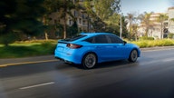 Automaker's popular sedan sports new look as EV demand slows