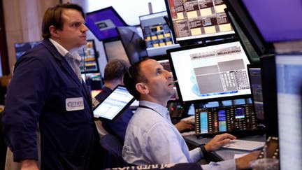 Traders work on the floor of the New York Stock Exchange during morning trading on April 29, 2024 in New York City. 