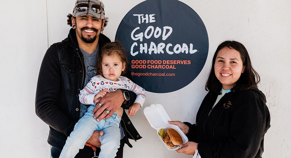 family at a good charcoal bbq
