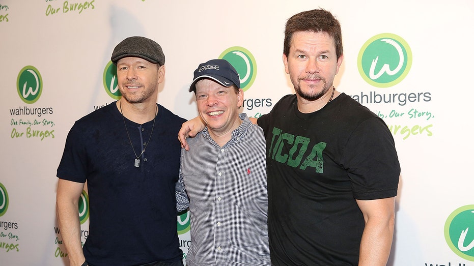 Donnie Wahlberg, Paul Wahlberg, and Mark Wahlberg posing together