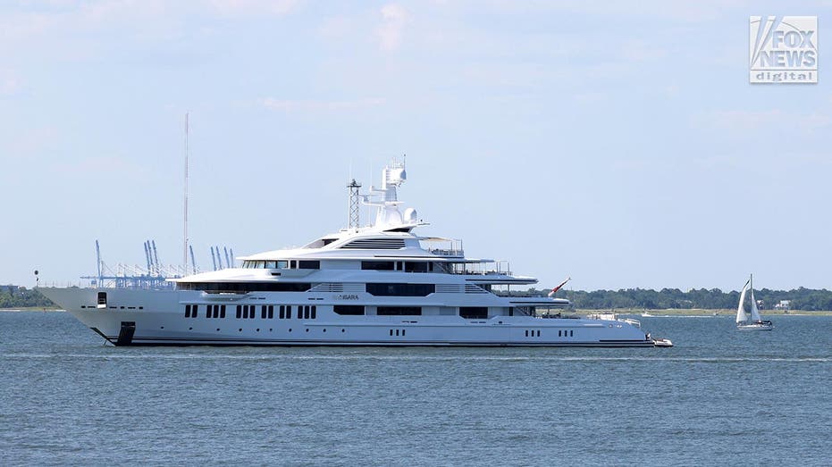 Massive white yacht owned by Harry Potter author, J.K. Rowling is moored in the middle of a harbor