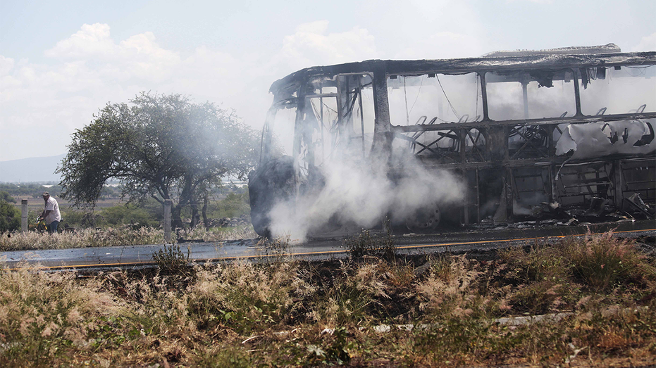 Burned bus involving cartel violence