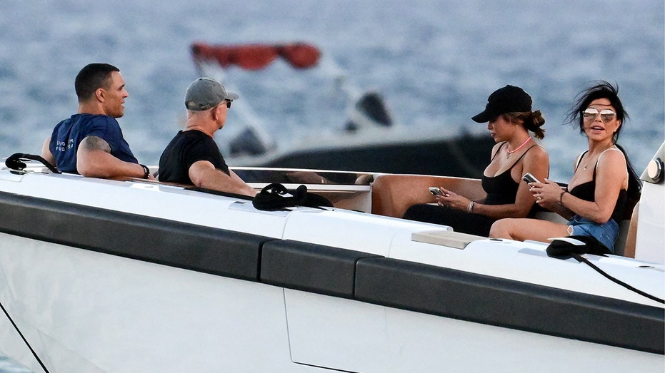Lauren Sanchez and Jeff Bezos on a boat with her ex, Tony Gonzales and his current wife, October