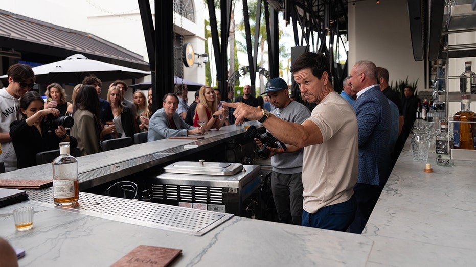 Mark Wahlberg behind the bar at Flecha