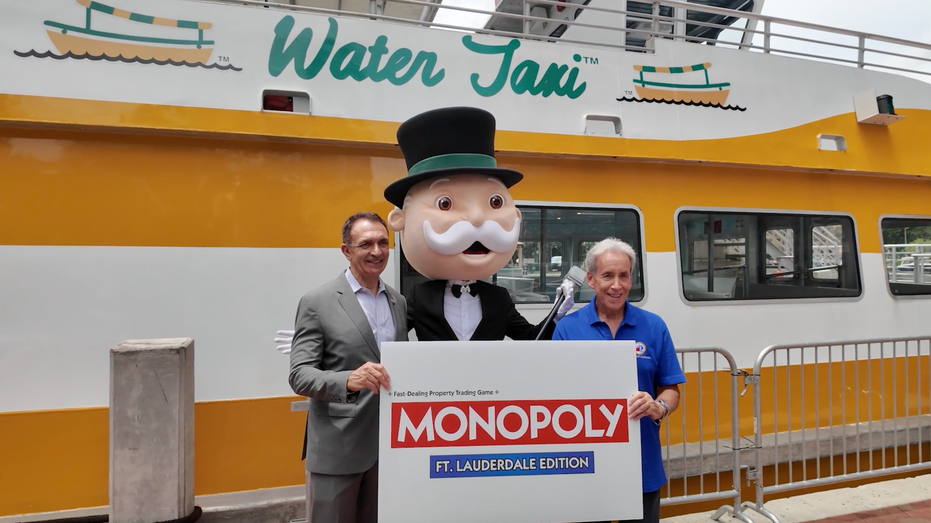 Monopoly man with elected officials