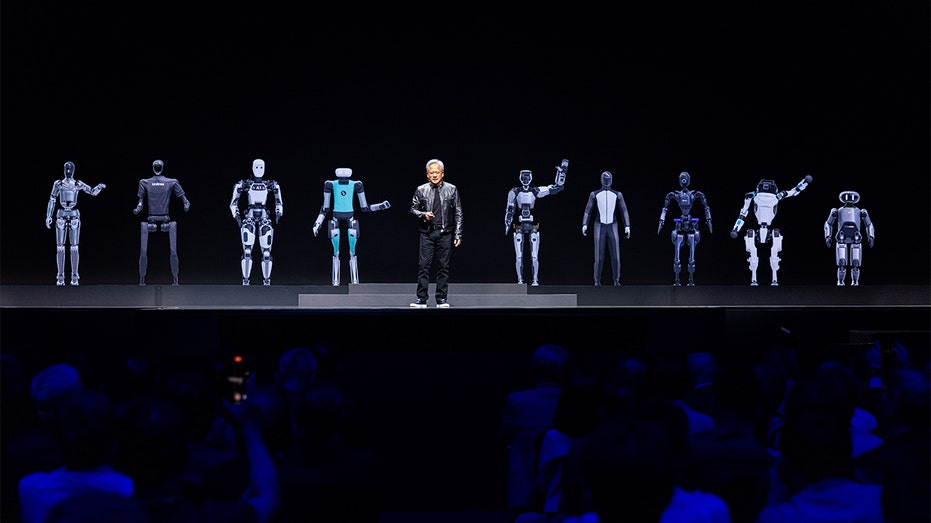 Huang showcasing humanoid robots.