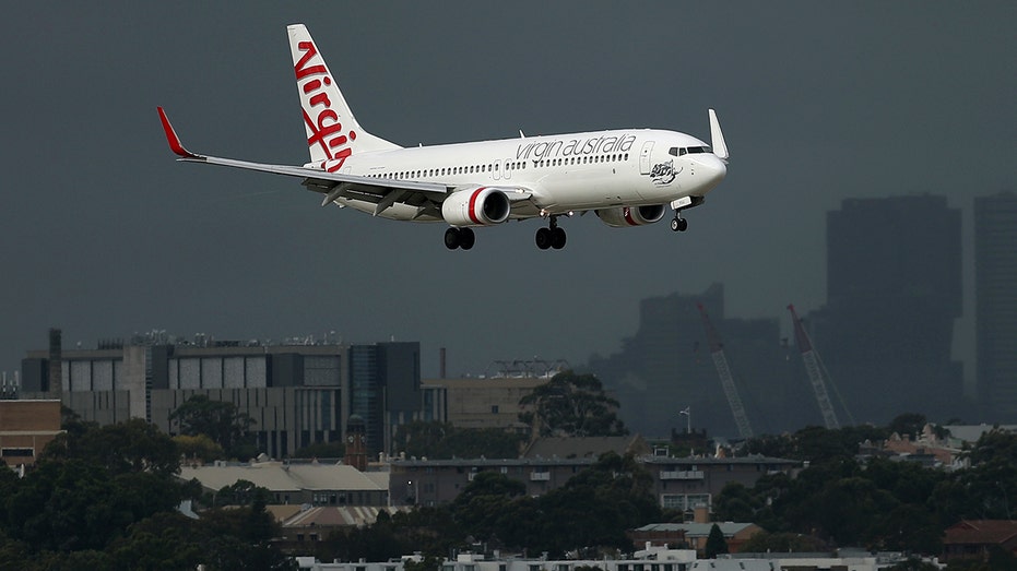 Virgin Australia plane prepares to land