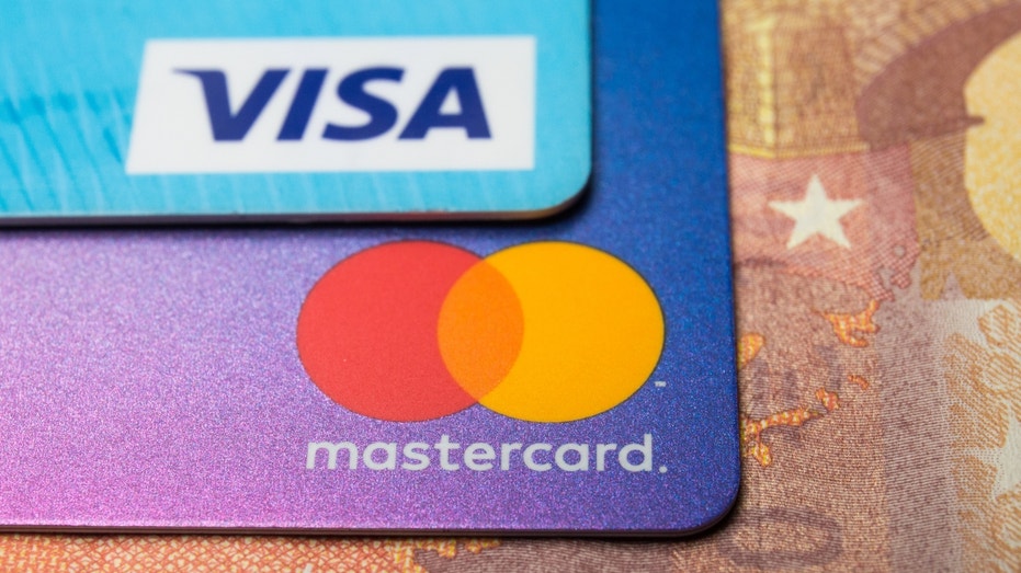 Judge rejects multi-billion Visa, Mastercard settlement in swipe-fee ...