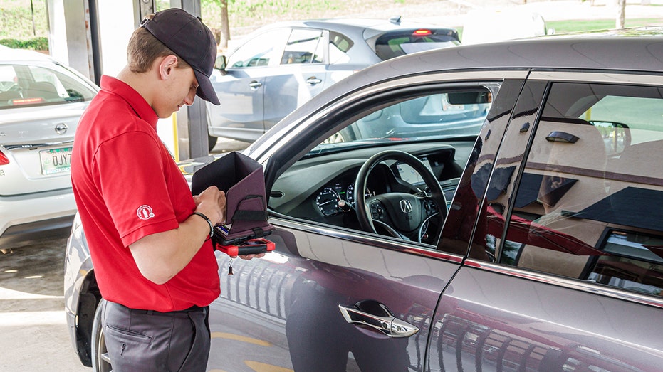 Chick-fil-A employee taking an order