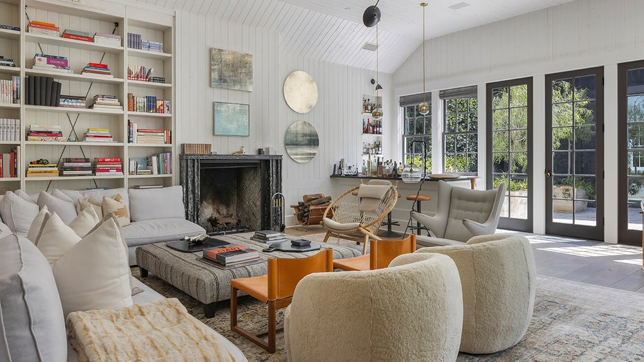 The home's family room with built-in bookcases