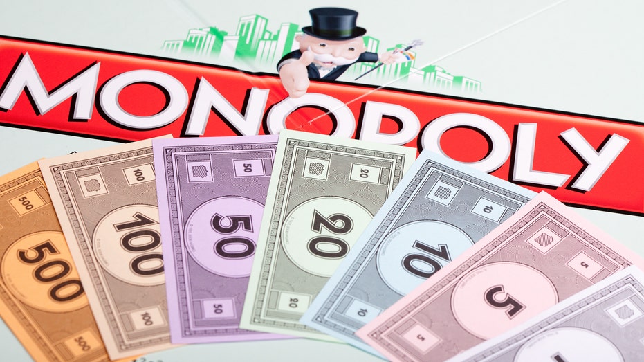 Monopoly board game, with money shown
