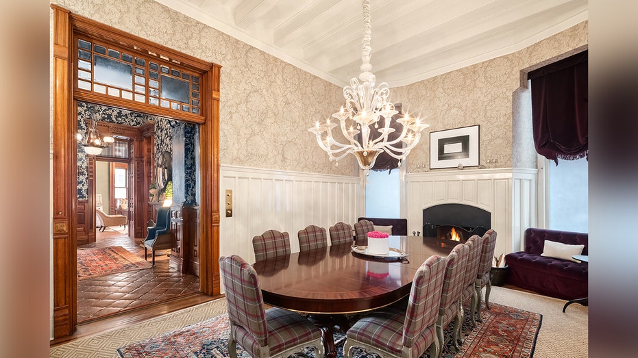 Large dining room with a chandelier