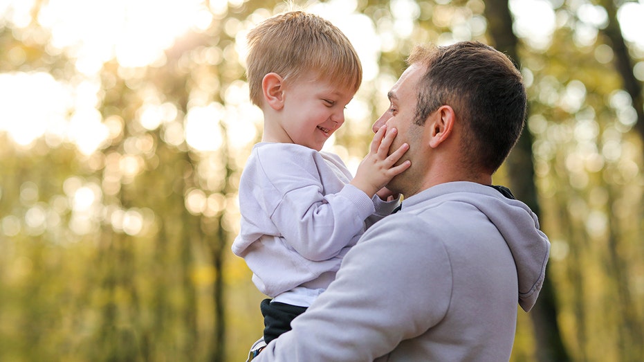 son showing father love on Father's Day