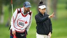 Lucy Li of the United States speaks with her caddie on the 15th green during the first round of the CPKC Women&apos;s Open at Earl Grey Golf Club on July 25, 2024 in Calgary, Alberta.