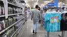 Gen Z man walking through an aisle of a Walmart store in Cheyenne Wyoming - August 2021. 