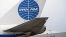 View of the tail section of a Boeing 747 aircraft, Hangar 19 at JFK Airport in the background. (Photo by: HUM Images/Universal Images Group via Getty Images) - Fox Business News