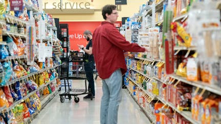 Shoppers look at items displayed at a grocery store in Washington, DC, on February 15, 2023. - Retail sales in the United States rebounded in January, government data showed Wednesday, logging the biggest gain since early 2021 as policymakers watch for signs that consumer spending is cooling in the longer run. (Photo by Stefani Reynolds / AFP) (Photo by STEFANI REYNOLDS/AFP via Getty Images)