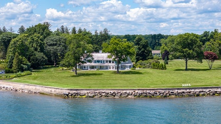 A view of the home and its water frontage