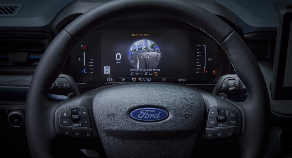 A view of the wheel and instrument cluster on the 2025 Ford Maverick Lobo.