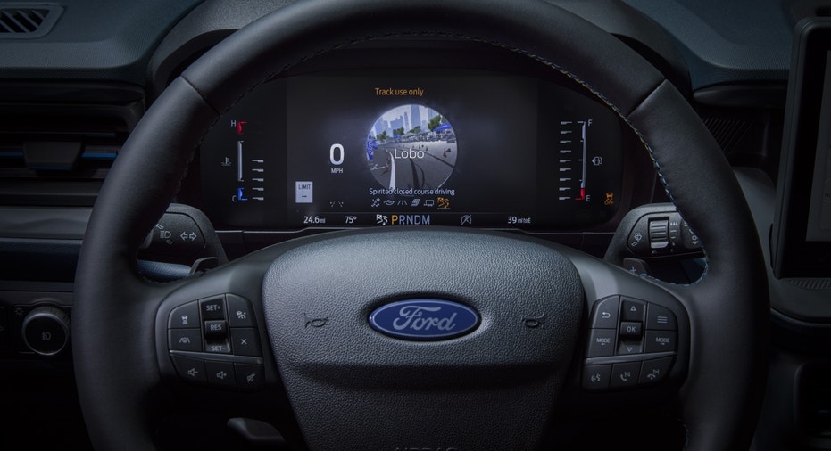 A view of the wheel and instrument cluster on the 2025 Ford Maverick Lobo.